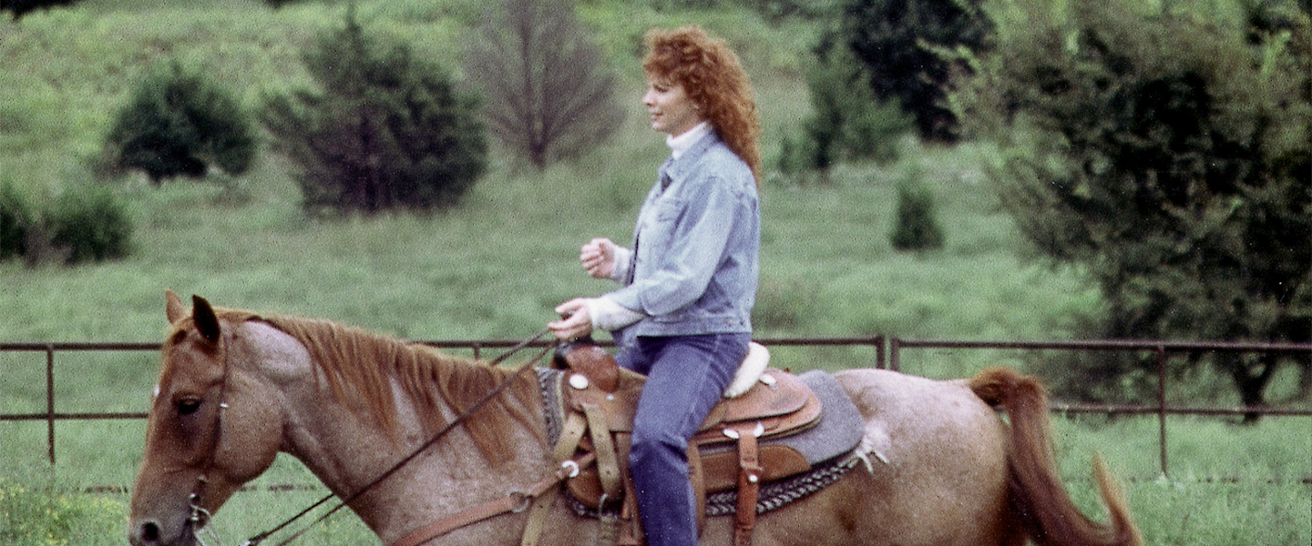 Reba on horseback